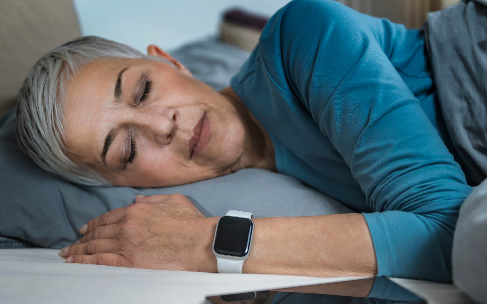 A CI user sleeping with a vibrating watch