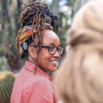 Woman with a colorful audio processor