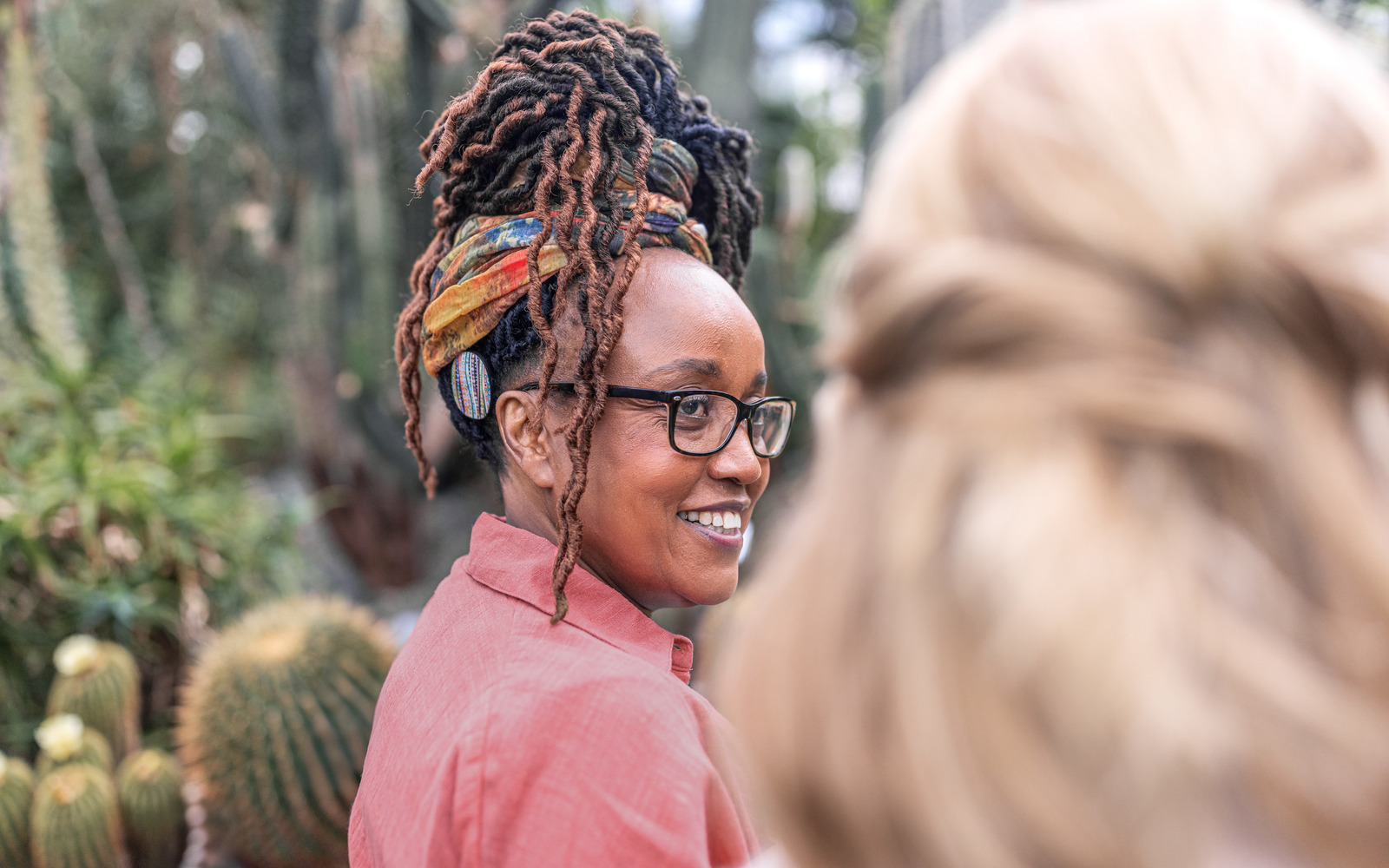 Woman with a colorful audio processor