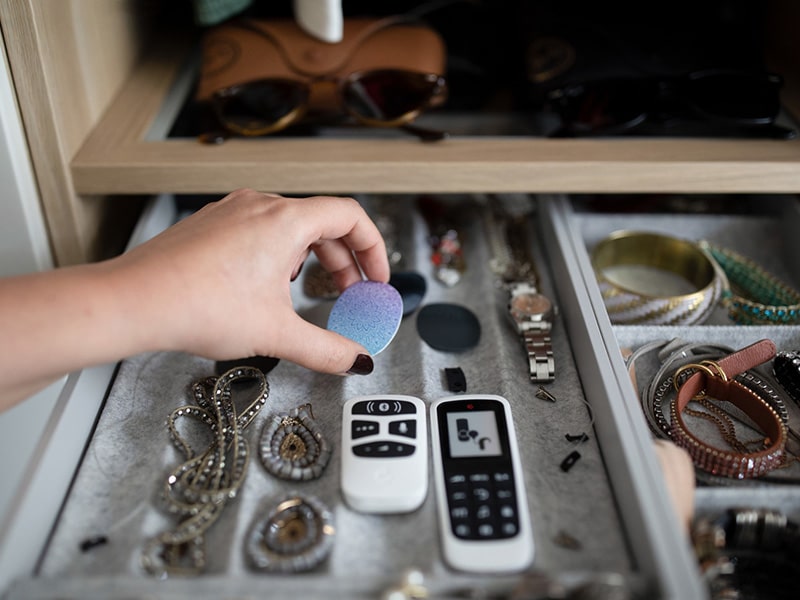 Jewelry box containing RONDO 3 audio processor design covers, AudioLink, and the FineTuner Echo remote