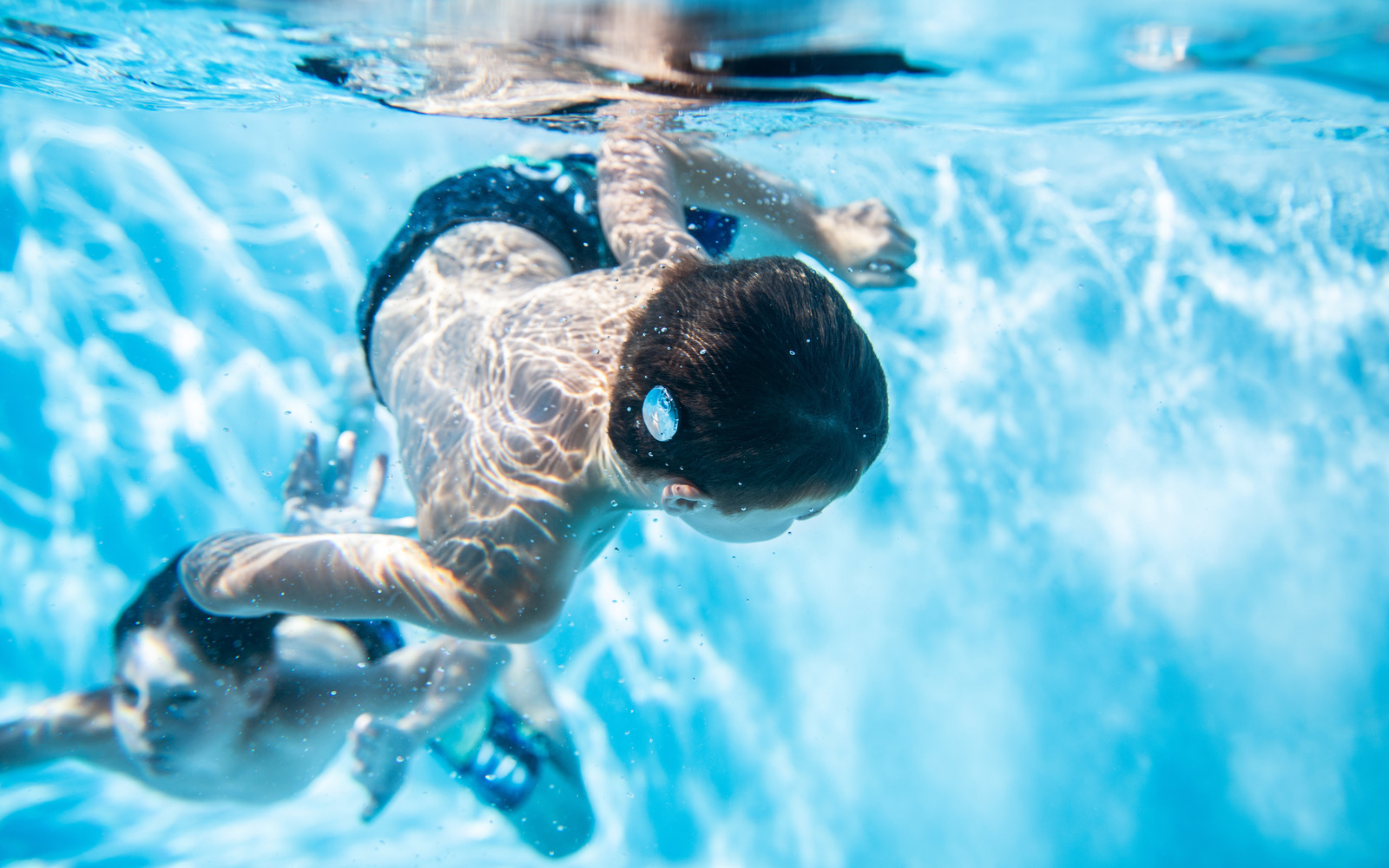 Can you swim with a cochlear implant?