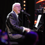 CI user Stephen Kiely performing at Beats of Cochlea 2025