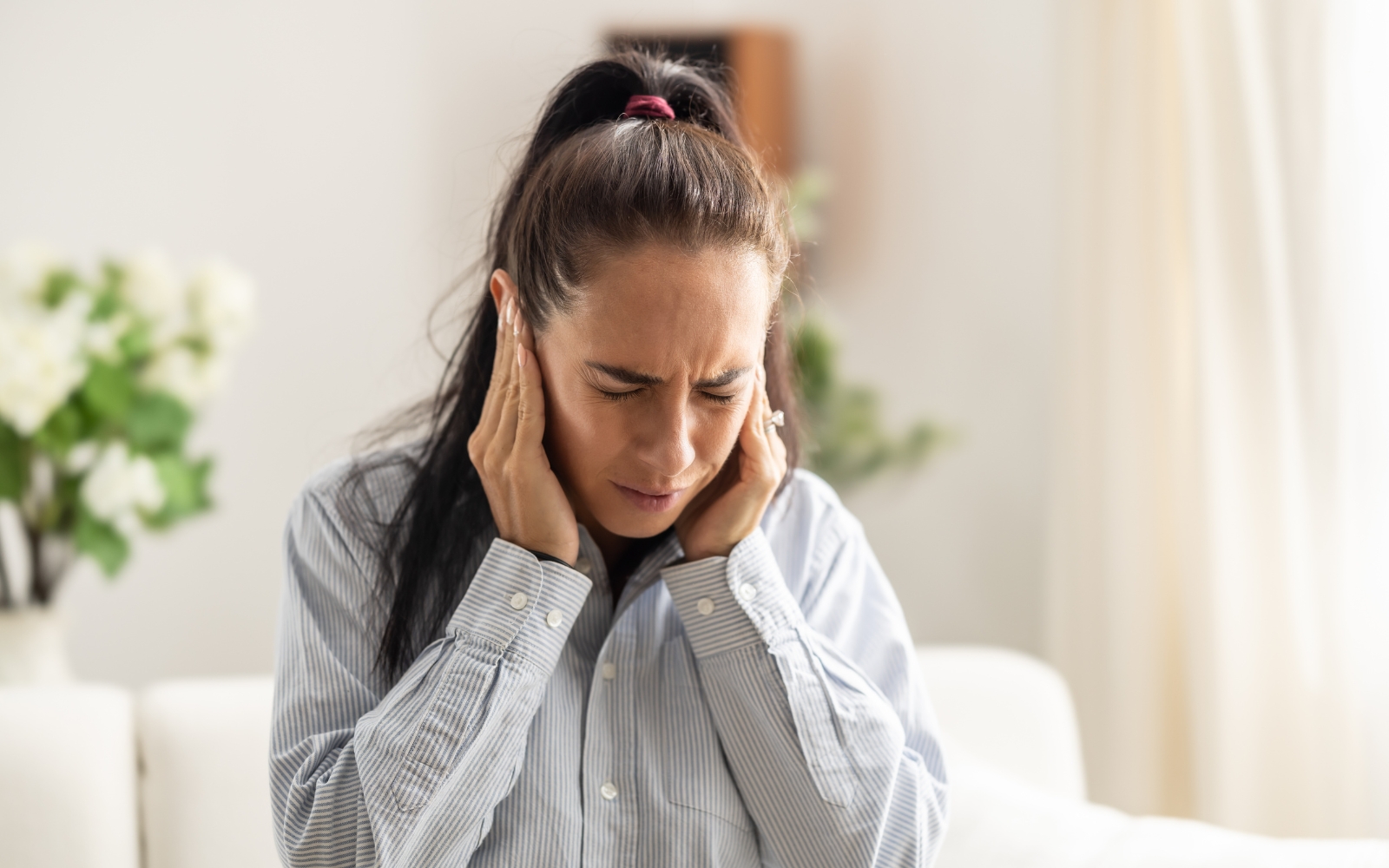 woman with ear pain
