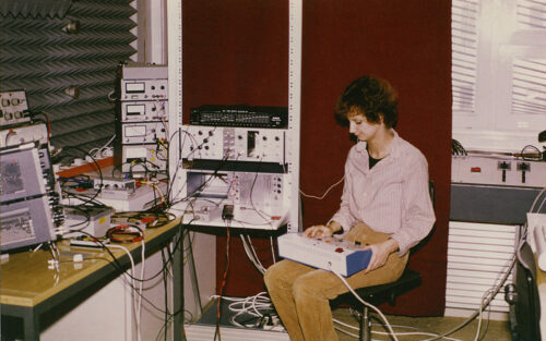 A women tests an early cochlear implant