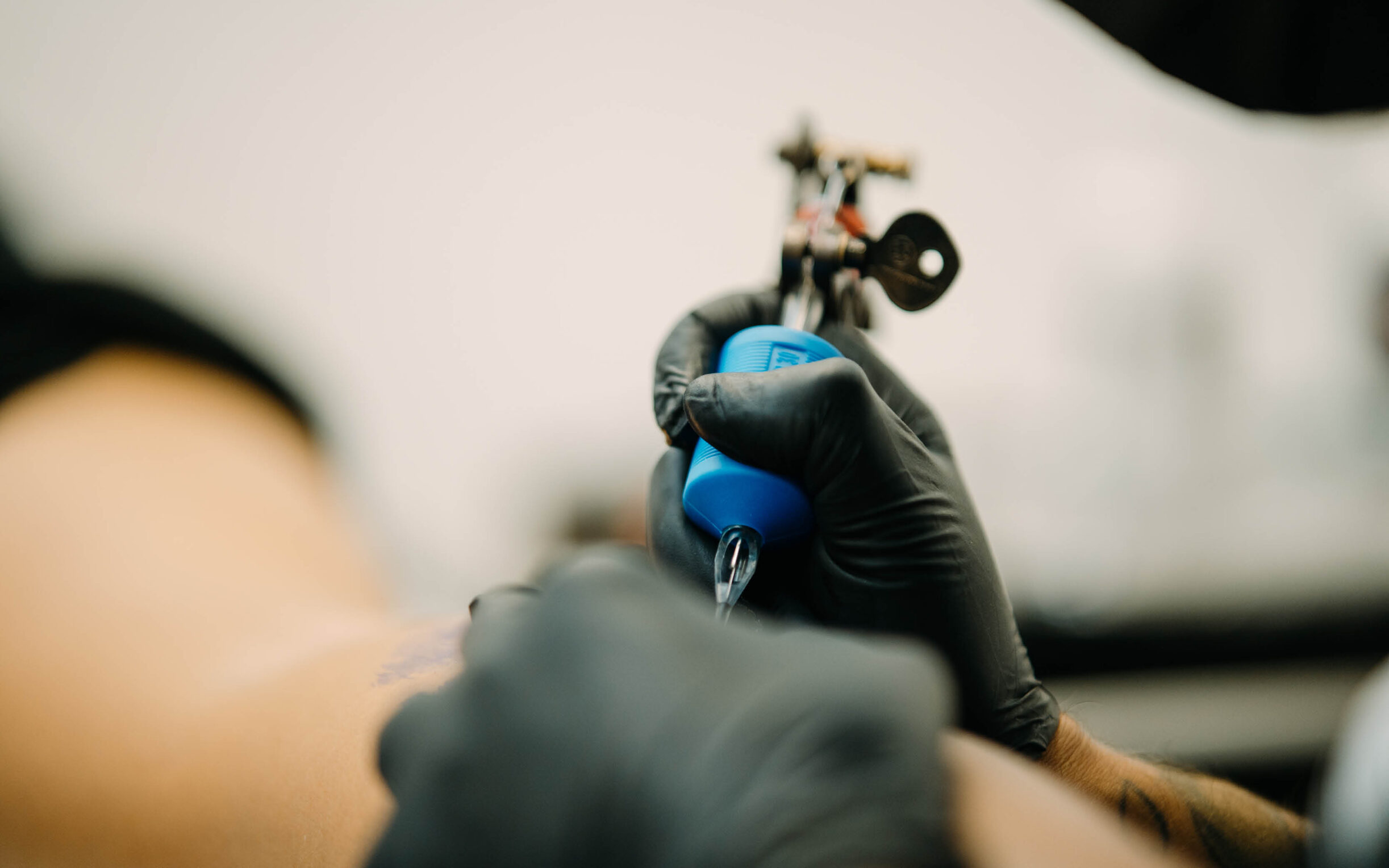 A person's arm being tattooed