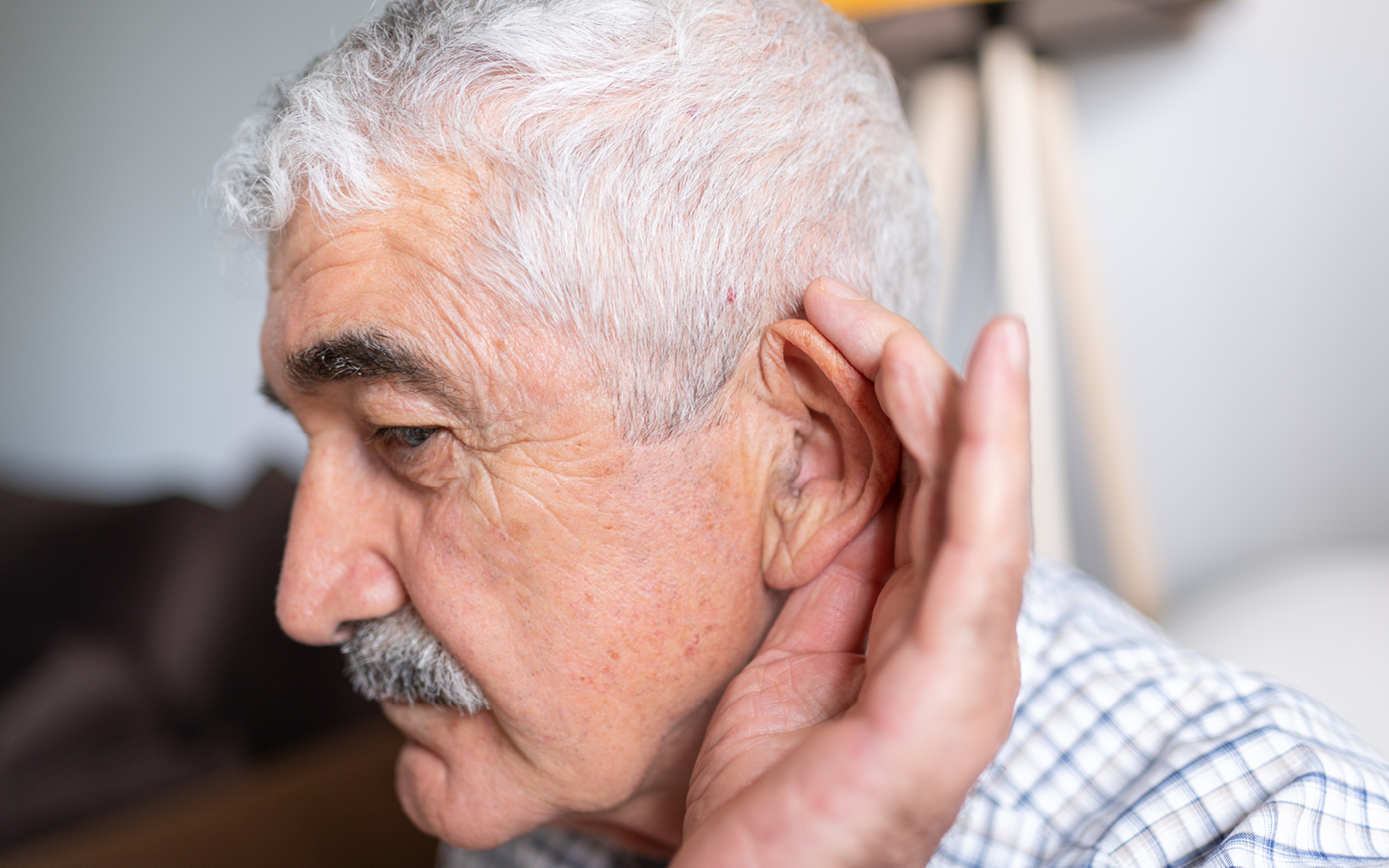 An older man with hearing loss