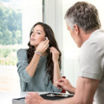 A woman with hearing loss trying an audio processor