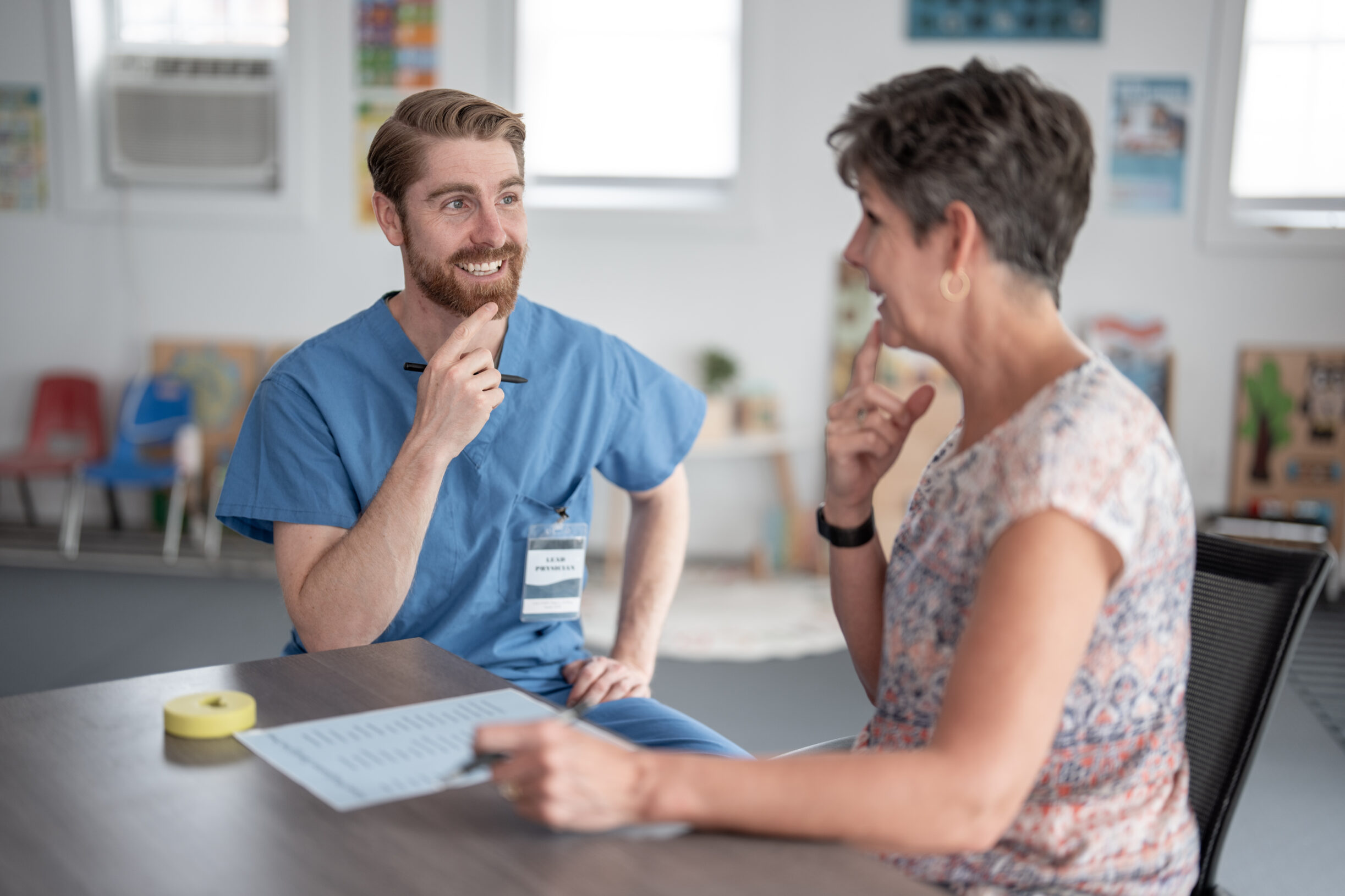 Therapist Engaging With Patient During Occupational Speech Therapy Session