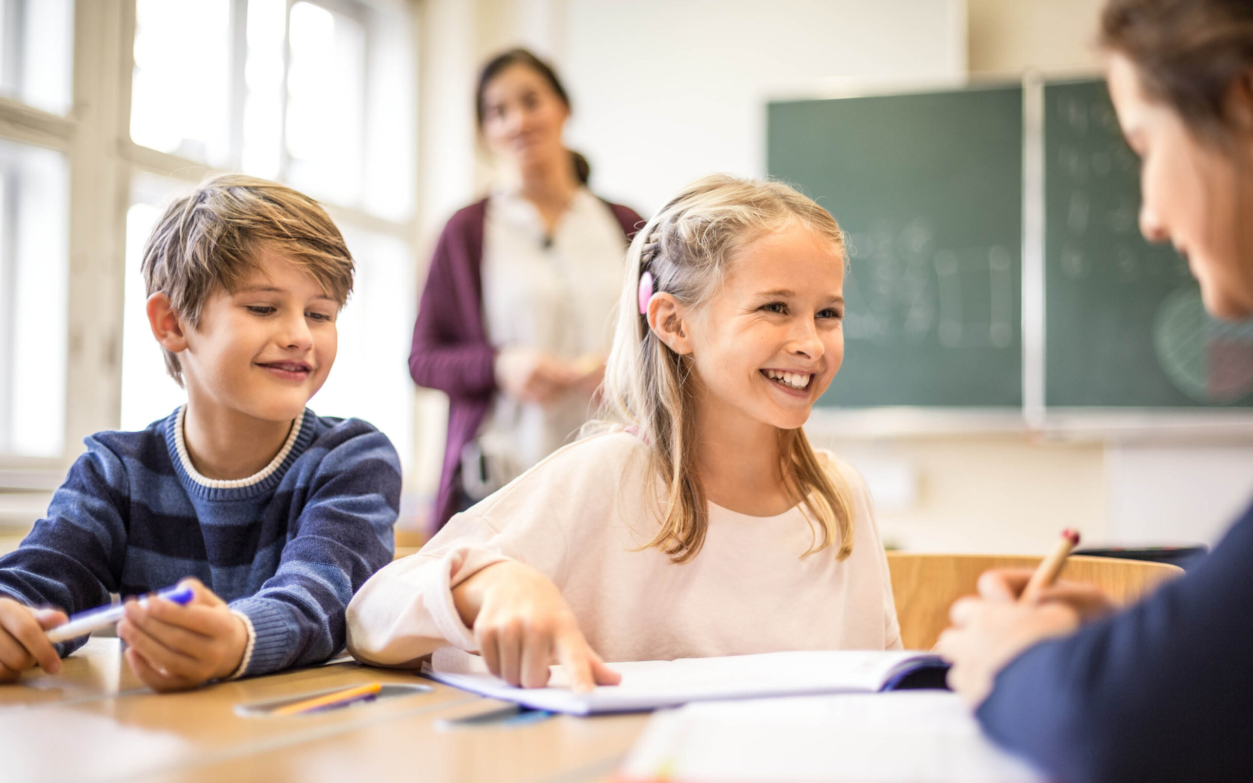 A child with a CI during class