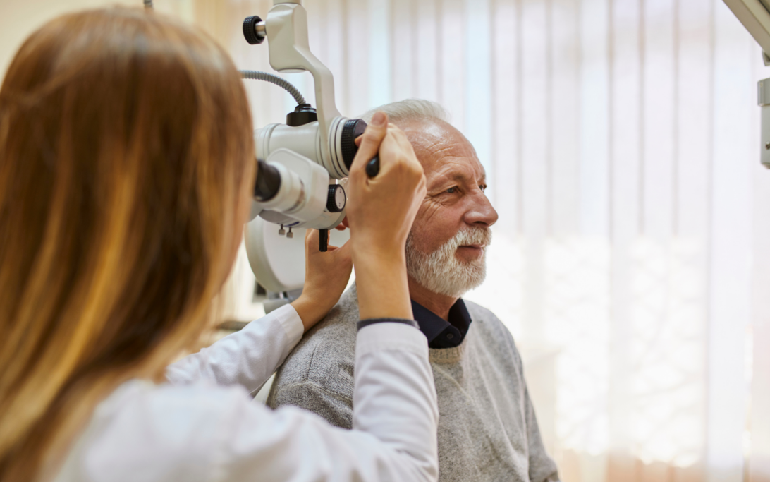 Person discussing diplacusis and double hearing symptoms with an audiologist